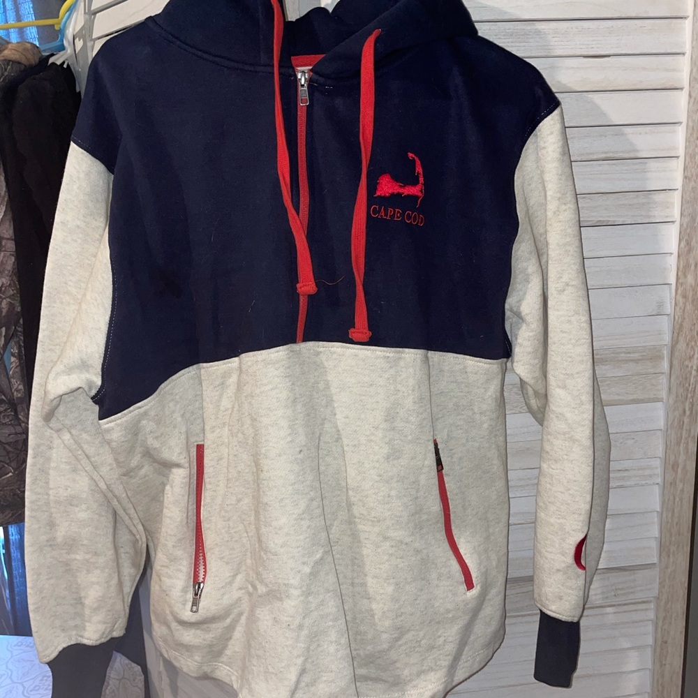 Women’s sweater size medium.